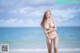 Beautiful Noree Key Wijitra shows hot body in the sea with white bikini (19 photos) P13 No.d3a58b